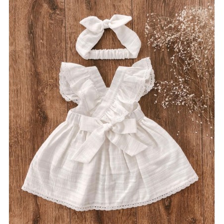 Kremowa sukienka z kokardką Mini Me